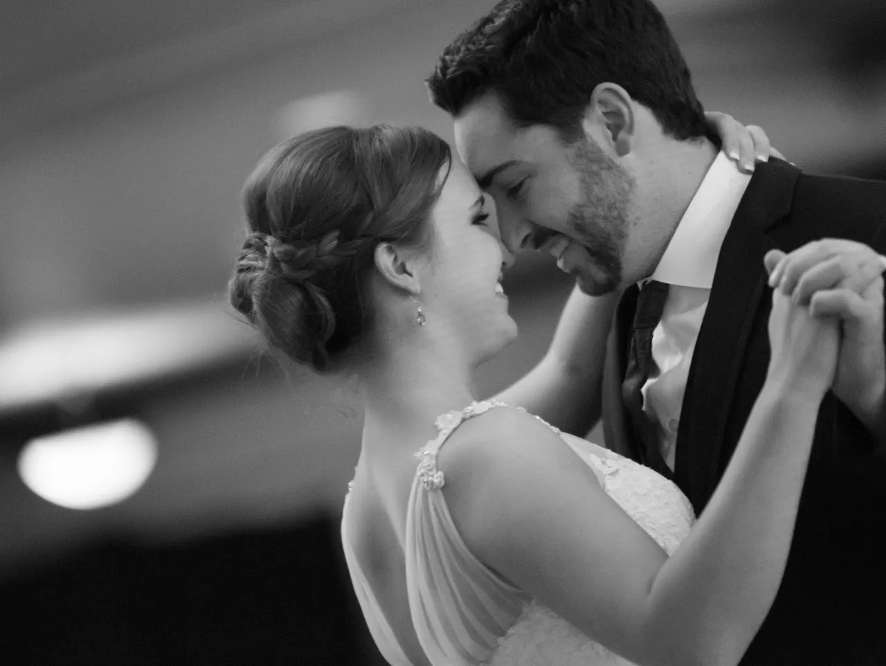 Black-and-white wedding portrait of the first dance — by Josh Brownlow